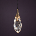 Large elongated hand-cut crystal pendant in an antique-bronze collar, lit